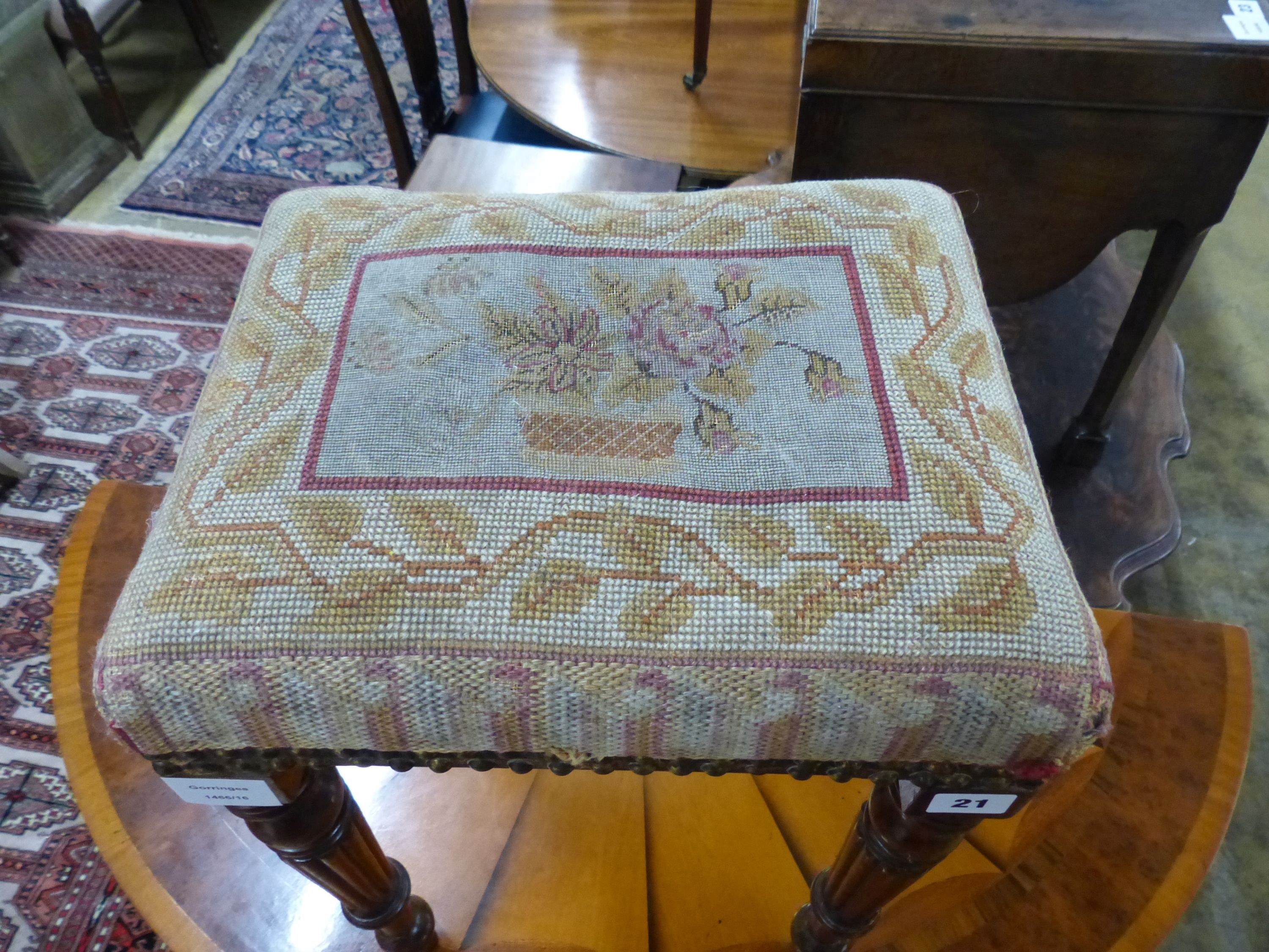 A small Regency mahogany upholstered stool, on fluted legs, W.35cm D.29cm H.51cm